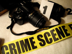 Crime Scene Tape and a camera